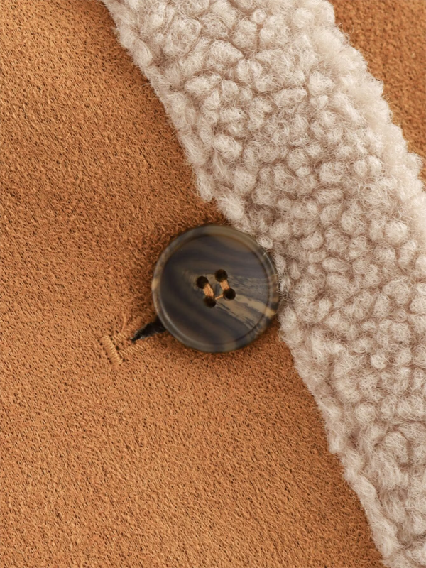 “Retro wollen damesjas met reverskraag – losse pasvorm